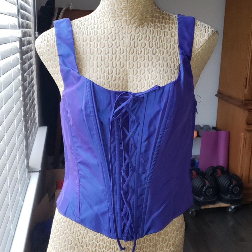 Size 9 zip on purple corset. Nwt.